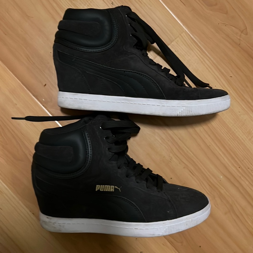 Puma Black High-Top Sneakers with White Soles and Gold Logo